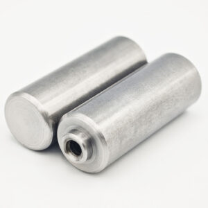 Stainless steel nut stud with internal thread and cylindrical locating pin