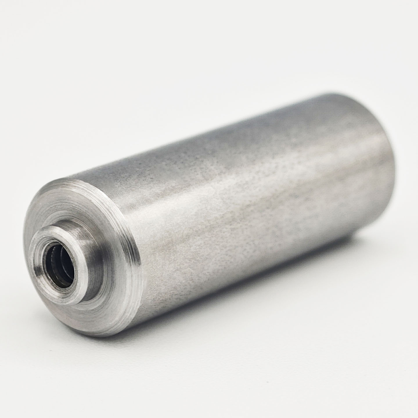 Stainless steel nut stud with internal thread and cylindrical locating pin